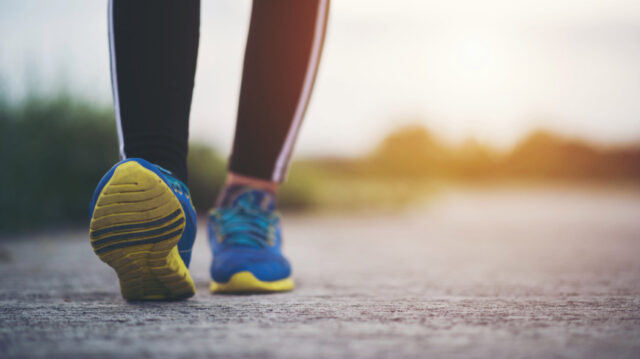 Close up on running shoes Fitness women training and jogging