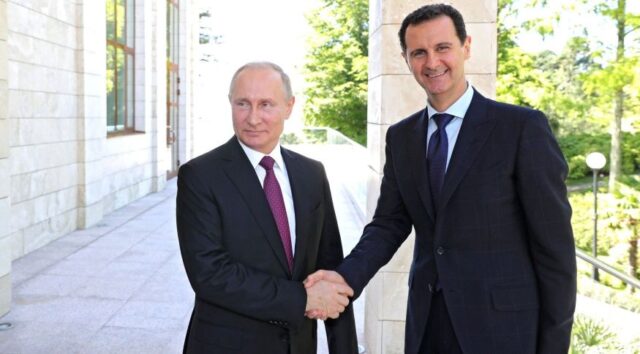 Presidentes Vladimir Putin, da Rússia, e Bashar Al-Asad, da Síria Imprensa do Kremlin/Anadolu Agency/Getty Images