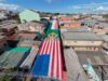 Com bandeirinhas e pinturas, ruas de Manaus se transformam para jogos do Brasil na Copa do Mundo